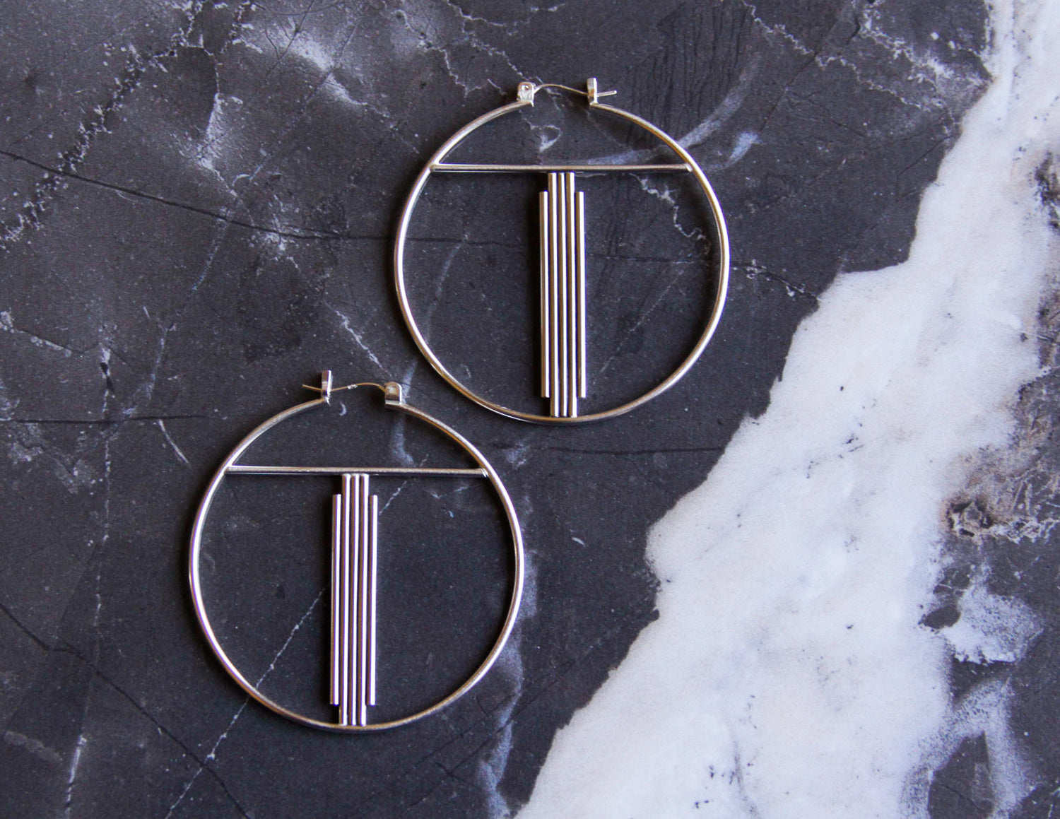 Handmade earrings in unique designs with high quality materials such as sterling silver, 14K gold and natural stones