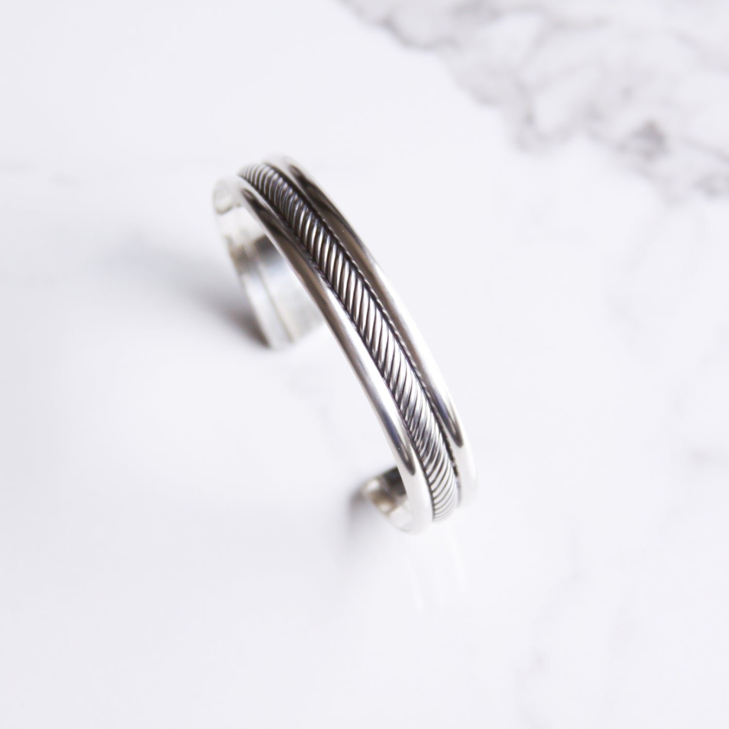 Bold, global, modern and unique chain bangle and cuff bracelets handmade with sterling silver and gold