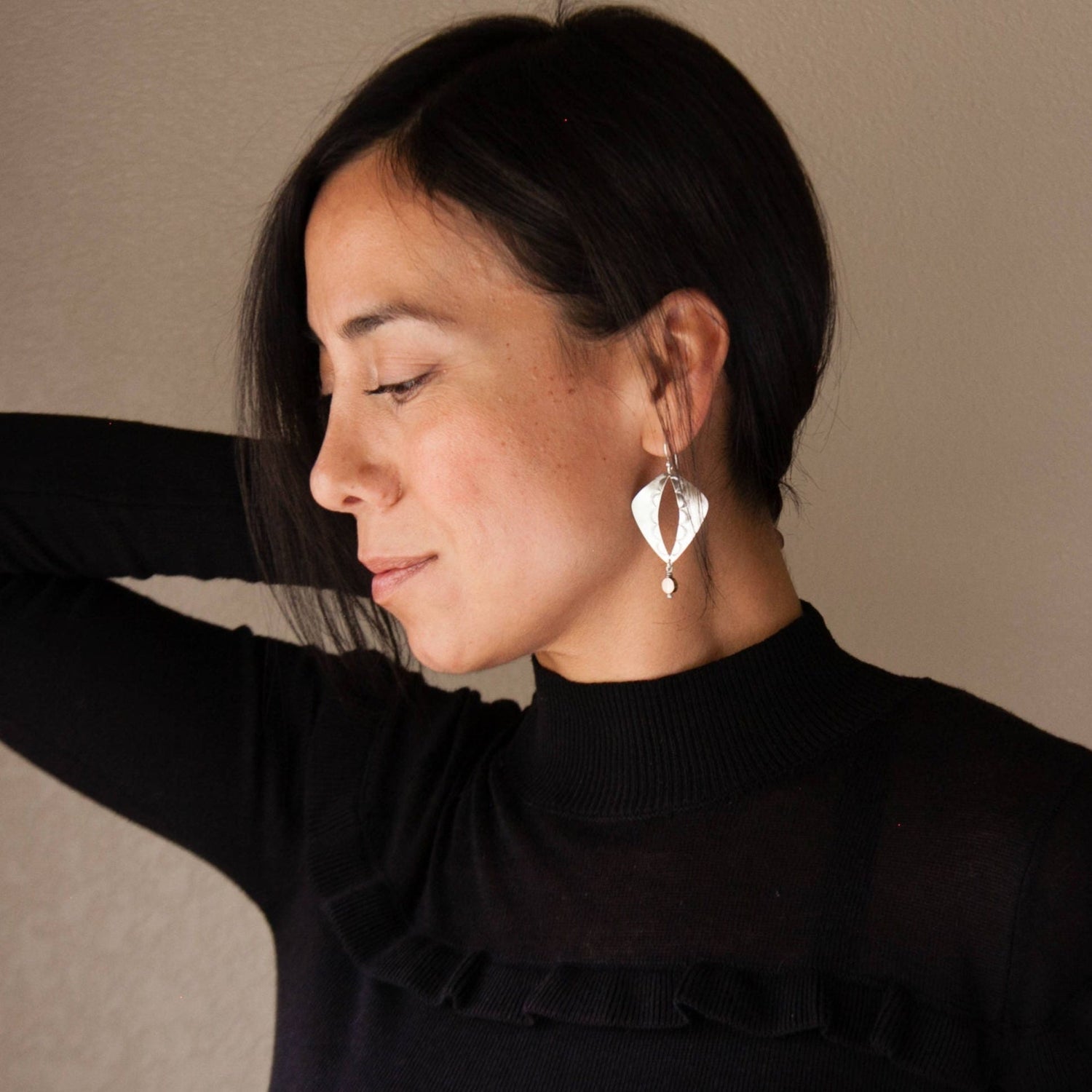 Handmade earrings in unique designs with high quality materials such as sterling silver, 14K gold and natural stones